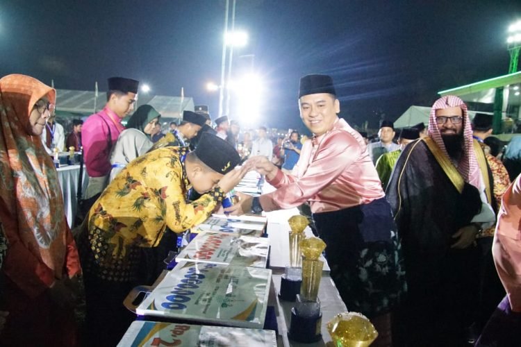 Syahrul Maulana Ismail utusan LPTQ Kabupaten Mimika meraih juara II pada ajang Seleksi Tilawatil Qur’an dan Musabaqah Al-Hadist Nasional (STQHN) XXVII yang digelar di Provinsi Jambi sejak tanggal 29 Oktober - 7 November 2023.