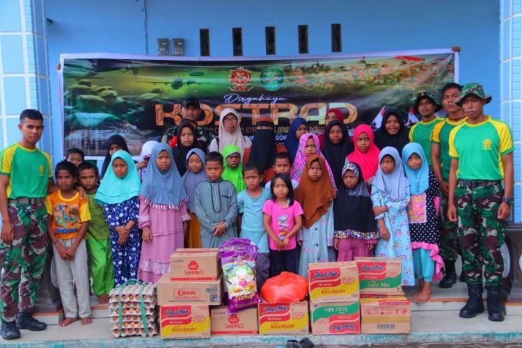 Wujudkan Kepedulian Kepada Masyarakat, Prajurit Yonif 754/ENK Gelar Bakti Sosial dalam Rangka HUT Kostrad ke-64