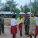 Satgas TMMD Kodim 1710/Mimika Dampingi Latihan Upacara Hardiknas di SD Naena Keakwa