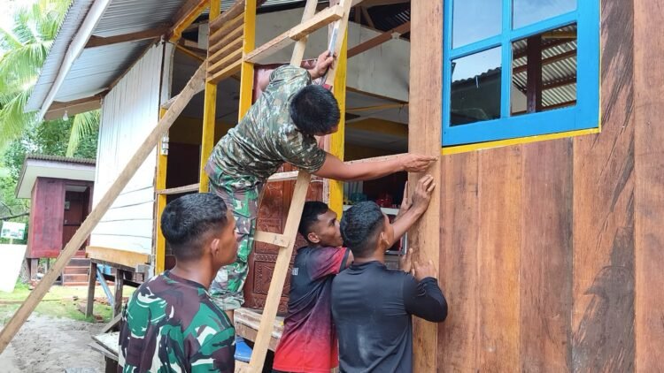 Satgas TMMD Kodim 1710/Mimika Mulai Pemasangan Dinding Gereja Santo Klemenst