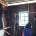 Satgas TMMD dan Warga Gotong Royong Pasang Rangka Dinding Gereja Santo Klemenst