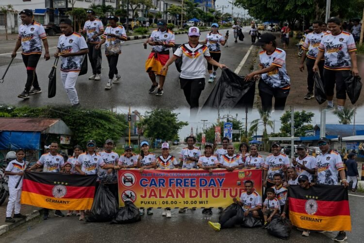 Tunjukkan Loyalitas, Fans Jerman Timika Ramaikan Car Free Day dan Gelar Bersih-Bersih