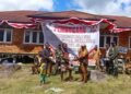 Semarakkan HUT RI ke-81, Distrik Jila Gelar Pesta Bakar Batu Usai Upacara Bendera