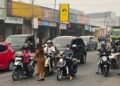 Bappeda Mimika Bagikan 5.000 Masker, Warga Diimbau Waspadai Bahaya Kabut Asap